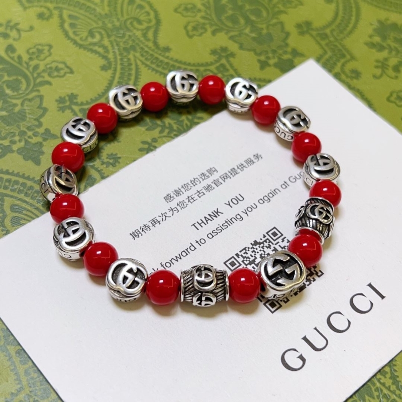 G*u*i bracelets